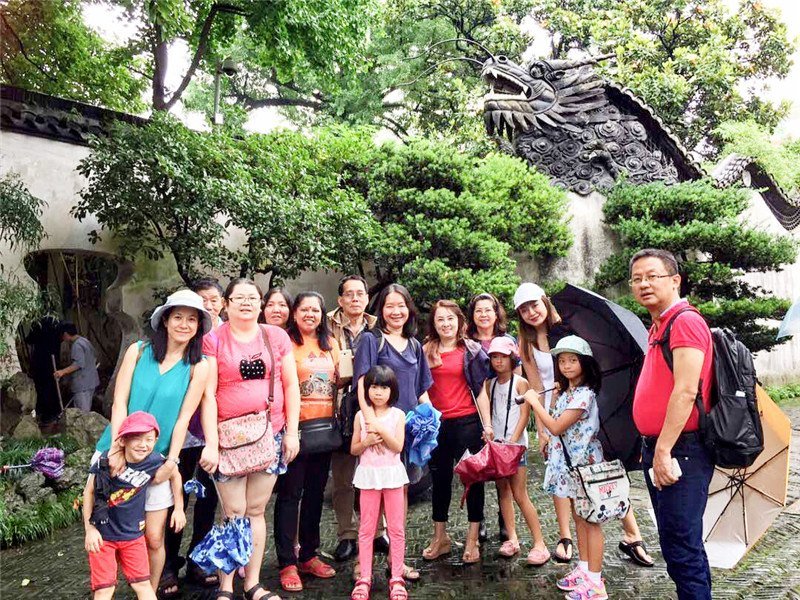 Travelers in a Chinese garden